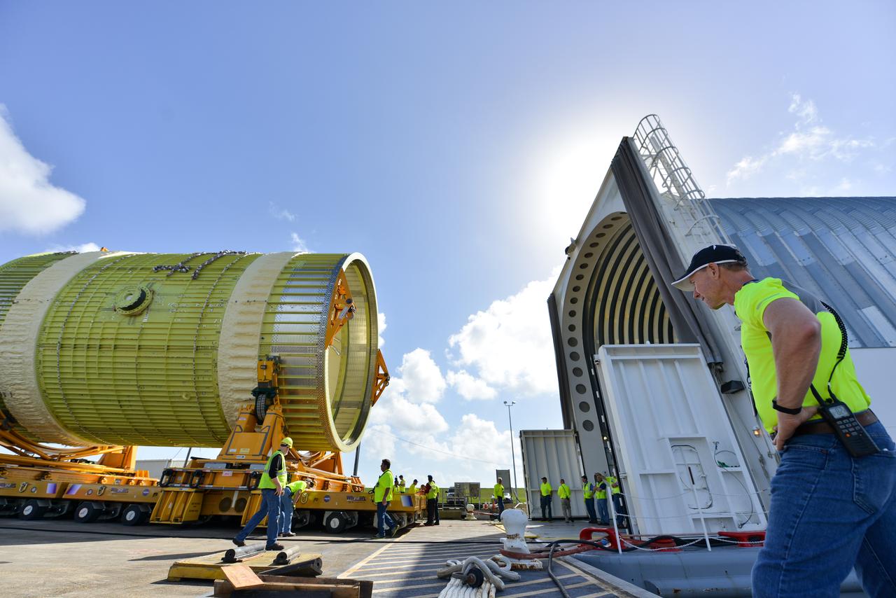 Pegasus Engineer watches the preparations before the move crew loads the Intertank STA on board.